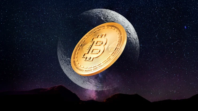 A bitcoin on the face of the moon, surrounded by a dark night sky