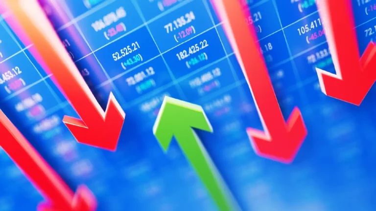 Financial tables with green up-arrows and red down-arrows