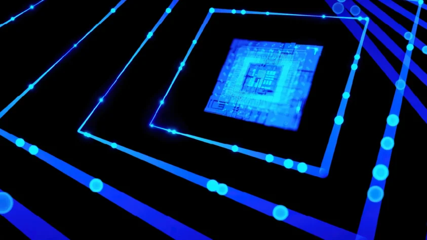 A blue semiconductor chip surrounded by concentric blue squares